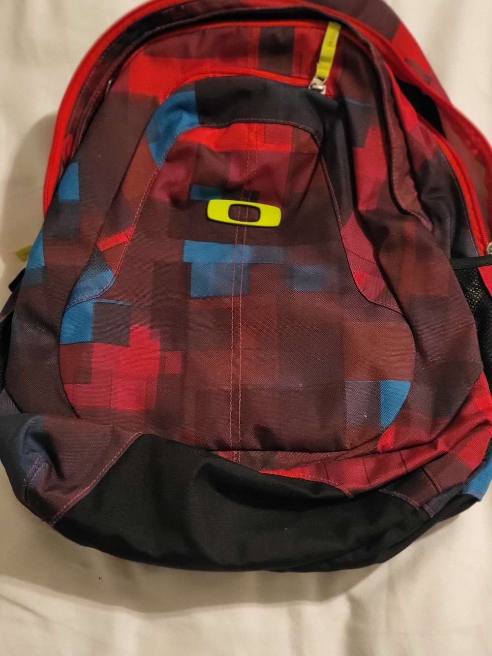 Oakley Pixel-Print Backpack in Red, Blue and Black with Lime Accent